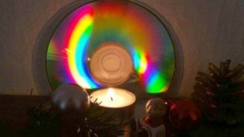 Lichterspiel aus alten CDs mit Teelicht