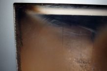 Rußflecken mit Fettlöser-Spray entfernen