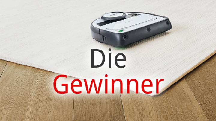 Ein Staubsauger f&auml;hrt &uuml;ber einen wei&szlig;en Teppichboden, w&auml;hrend der Text &bdquo;Die Gewinner&ldquo; in roter Schrift erscheint.