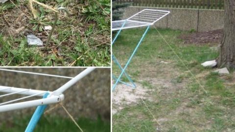 Ein Wäscheständer steht stabil im Freien, während eine Schnur ihn am Boden sichert, um das Umkippen zu verhindern.