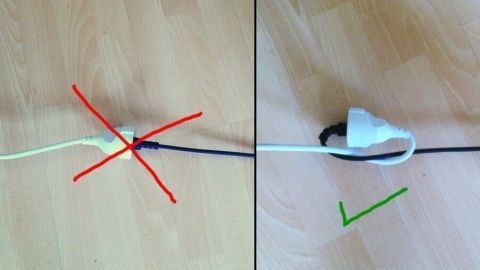 Ein Kabel liegt auf dem Boden. Auf der linken Seite ist es falsch verbunden (rot markiert), rechts korrekt (grün markiert).