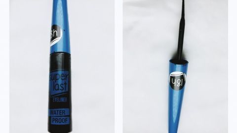 Ein Eyeliner mit einem schlanken Applikator liegt auf einem weißen Hintergrund, ideal für einen dichteren Wimpernrand.