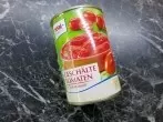 Dosentomaten schnell zerkleinern mit dem Kartoffelstampfer