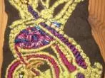 Mit Plattstich Bilder sticken oder Kleidungsstücke besticken