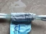 Tuben aus Metall aufrollen