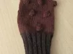 Anordnung von Strukturen/Mustern auf Strickhandschuhen