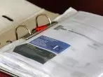 Handbücher/Anleitungen vor Verschmutzung schützen