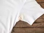 Deoflecken auf Oberbekleidung entfernen