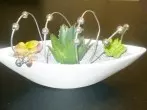 Vom Drahtkleiderbügel zu einer modernen Dekoration