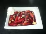 Knusprig gebratene Schupfnudeln mit Roter Grütze