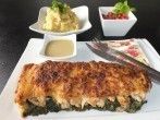 &Uuml;berbackener Fisch mit Leinsamen-<strong>Parmesankruste</strong> auf Blattspinat