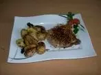 Schweinekotelett mit frittiertem Sauerkraut