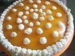 Mandarinensahne mit Keksboden und Mangospiegel
