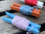 Stickgarn ordentlich aufbewahren mit Wäscheklammern