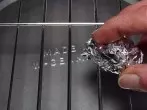 Grillrost säubern mit Alufolie
