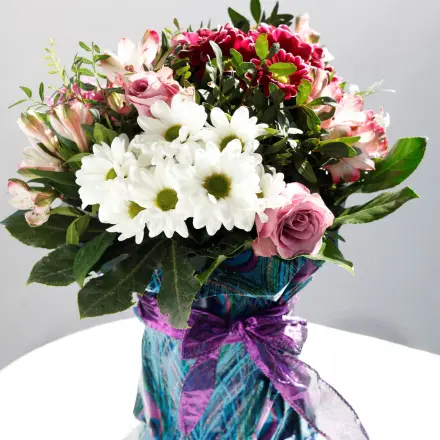 Blumen in Gurkengläsern