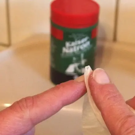Druckertinte an Fingern entfernen