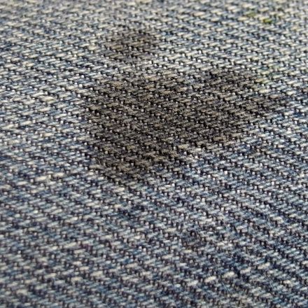 Schmierfleck auf Jeans