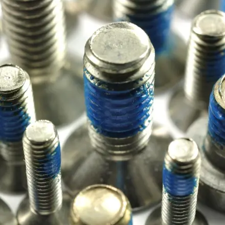 Schraubensicherung lösen