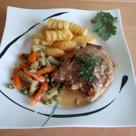 Gefüllte Schweinekoteletts mit Steinpilz