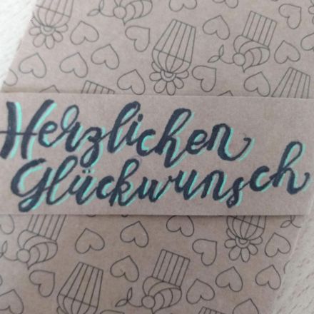 Verpackung für einen Gutschein entwerfen und herstellen