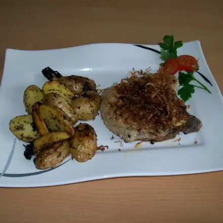 Schweinekotelett mit frittiertem Sauerkraut