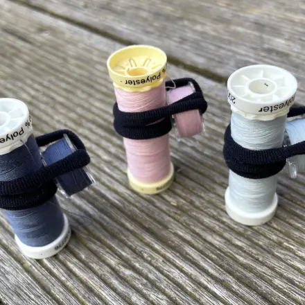 Unterfadenspulen ordentlich aufbewahren