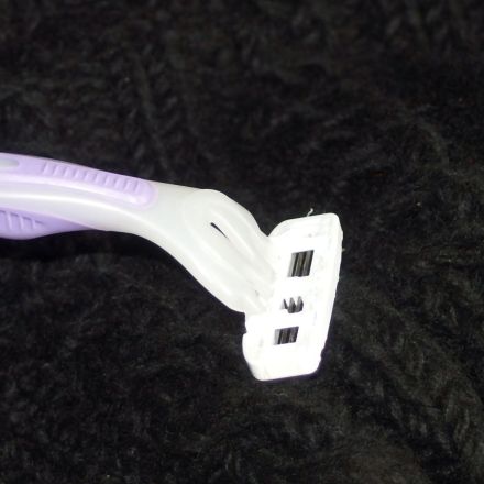 Fussel von Kleidung entfernen