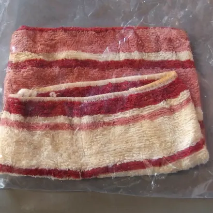 Eingetüteter Waschlappen