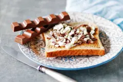 Was S&uuml;&szlig;es auf Toast? Nimm Kinderschokolade