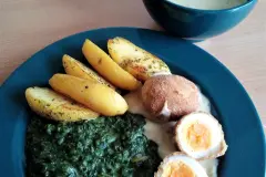 Frittierte Eier mit Rahmspinat