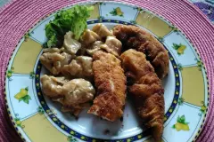 Hähncheninnenfilet paniert mit Tortellini in Rahmsoße